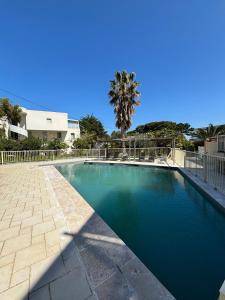 Appartements La Petra Marinella - Appt climatise avec piscine : photos des chambres