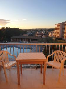 Appartements Les Hauts de Balaruc studio ou T2, renoves , climatises, vue panoramique, parking : photos des chambres