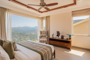 ELIVAAS privé The Royce Daisy Ultra-Luxe 4 BHK Villa with Pvt Heated Pool, Jacuzzi, Steam Room & Hill Views