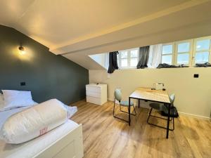 Appartements Studio cosy avec salle de sport : photos des chambres