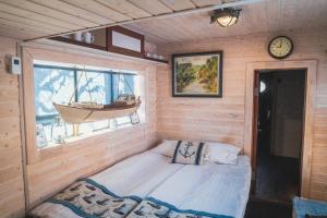 Cozy little house with sauna on a fishing boat