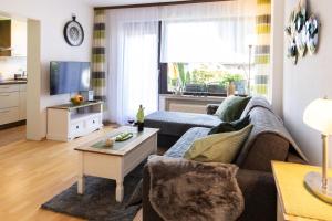 FeWo Harzer Bergwind Sankt Andreasberg, 1 Hund bis 30Kg willkommen, große eingezäunte Terrasse mit Gasgrill