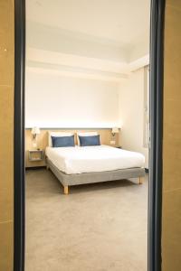 Hotels Kyriad Villefranche Sur Saone Porte du Beaujolais -Renove- : photos des chambres