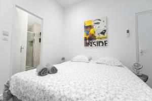 Appartements T3 spacieux avec terrasse et parking privatif : photos des chambres