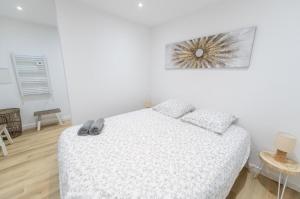 Appartements T3 spacieux avec terrasse et parking privatif : photos des chambres