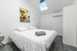 Appartements T3 spacieux avec terrasse et parking privatif : photos des chambres