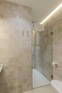 Plaza Victoria Apartment by Caleta Homes