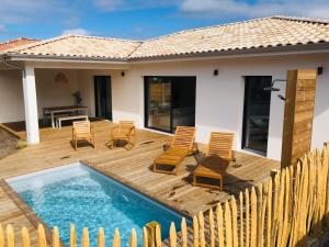 Villas Modern house with pool, between lake and forest : photos des chambres