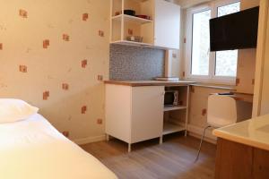 Appartements Revotel - Studio & Chambre - Semaine & Mois : photos des chambres