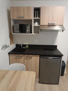 Appartements Revotel - Studio & Chambre - Semaine & Mois : photos des chambres