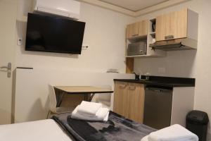 Appartements Revotel - Studio & Chambre - Semaine & Mois : photos des chambres