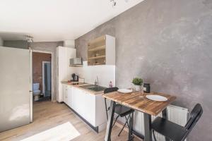 Appartements Le Patio Champenois : photos des chambres
