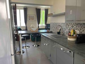 Appartements Gite l-Olivier : photos des chambres