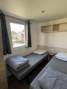 Campings mobil home 6 personnes acces direct plage : photos des chambres