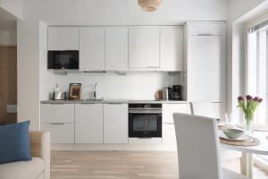 Fredika, modern 1br,Tripla Pasila prime location, gym, parking, train station near