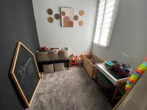 Maisons de vacances Charmante maison de famille avec jardin : photos des chambres