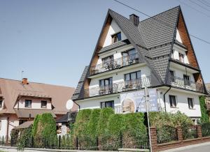 Pokoje z własnymi aneksami kuchennymi - Zbigniew Lassak