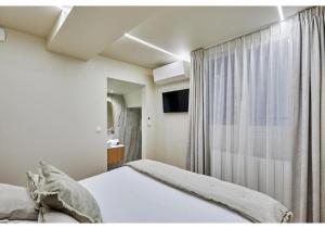 Apartment Le Marais place des Vosges by Studio prestige