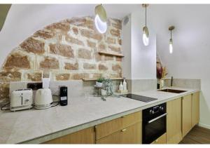 Apartment Le Marais place des Vosges by Studio prestige