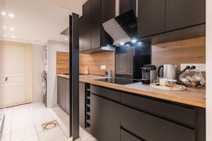 Appartements Artistic Family Apartment 15 minutes of Paris : photos des chambres
