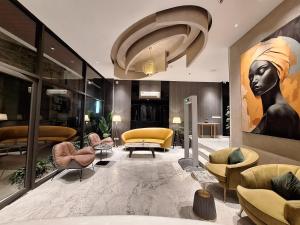 IVA Premium Aerocity - Free Airport Pickup or Drop