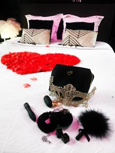 Appartements Suite Passion - Jacuzzi prive - Table massage : photos des chambres