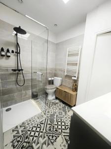 Appartements Suite Passion - Jacuzzi prive - Table massage : photos des chambres