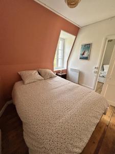 Appartements Le Merlin : photos des chambres