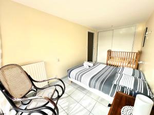 Maisons de vacances Charmante maison les pieds dans l'eau : photos des chambres