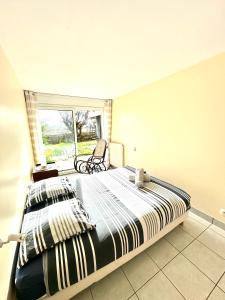 Maisons de vacances Charmante maison les pieds dans l'eau : photos des chambres