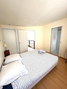 Maisons de vacances Charmante maison les pieds dans l'eau : photos des chambres