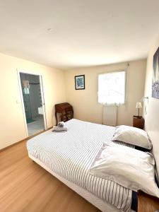 Maisons de vacances Charmante maison les pieds dans l'eau : photos des chambres