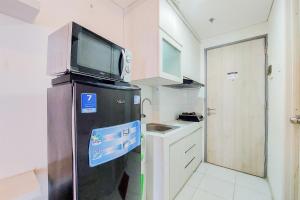 Simply Look and Warm Studio Apartment at Akasa Pure Living BSD By Travelio