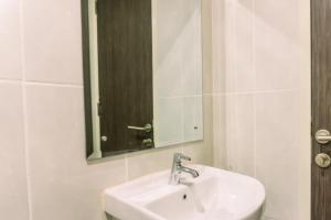 Minimalist 2BR Apartment at Serpong Garden near Train Station By Travelio