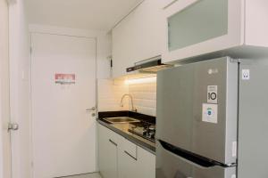 Cozy Stay Studio at Urbantown Serpong Apartment By Travelio