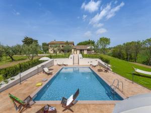 Inviting Holiday Home in San Costanzo with Swimming Pool