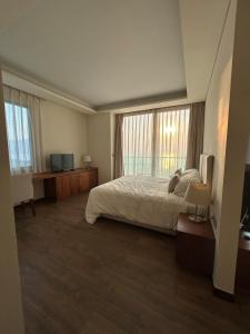 Aparthotel in A la Carte - 2 bedrooms, 3 balconies, seaview, beachfront, central, rooftop pool