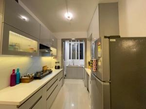 Hostie Spriha-3BHK Serviced Apartment near Golf course road & Worldmark, Gurgaon