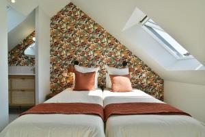 Maisons de vacances Lys-toire - Grand Jardin : photos des chambres