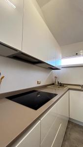 Attico in the city center, terrace & stunning lake view