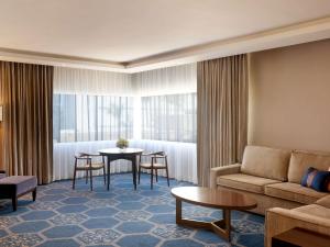 One Bedroom Suite with Two Queen Beds and Parlor with Sitting Area room in Fairmont El San Juan Hotel