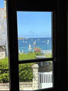 Maisons de vacances hjem Port Blanc A breathtaking setting facing th : photos des chambres