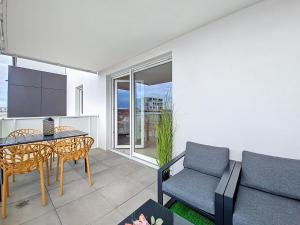 Appartements Chez Lady Mag - Neuf - Confort - Parking - Proche centre-ville - Tram : photos des chambres