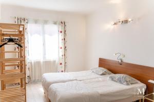 Appartements Spacieux T3 avec parking au coeur de Sanary : photos des chambres