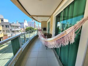 201- Apartamento Bombas com vista lateral do mar