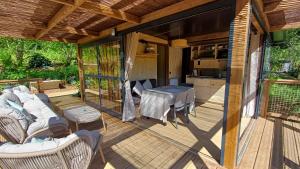 Campings Lodge premium Pique poque : photos des chambres