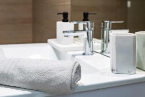 Residence Gilbert - Appartements design centre ville : photos des chambres