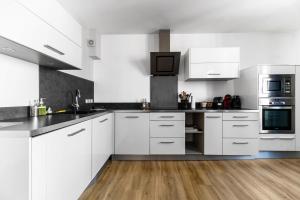Residence Gilbert - Appartements design centre ville : photos des chambres