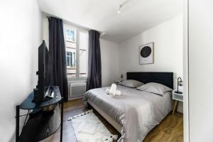 Residence Gilbert - Appartements design centre ville : photos des chambres