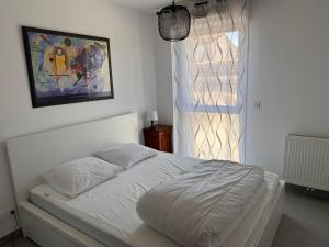 Appartements Superbe T3 proche remparts 2 places de parking : photos des chambres
